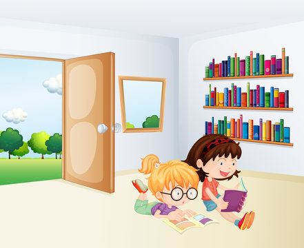 Two girls reading inside a room