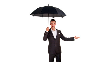Young business man with an umbrella checking the rain on