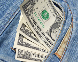 Banknotes dollars in jeans pocket