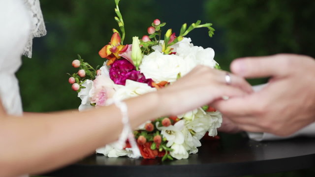 Giving a wedding bouquet