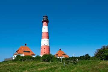 Fototapeta na wymiar Leuchtturm Westerheversand, Schleswig-Holstein, Deutschland, Europa