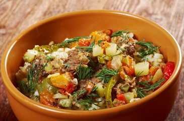 boiled pearl barley with meat and vegetable