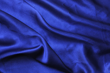 Fototapeta na wymiar Niebieska zasłona jedwabiu