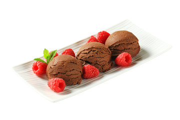 Chocolate ice cream with fresh raspberries
