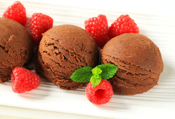 Chocolate ice cream with fresh raspberries
