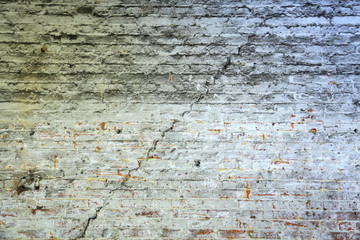 Old cracked brick wall
