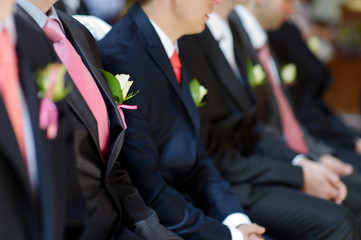 Wedding boutonniere on jacket of groom's man