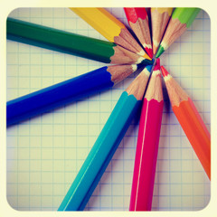 pencil crayons on a notebook