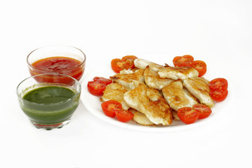 Delicious roasted fish with green and red sauce