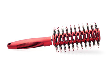 red round hairbrush with bristle isolated on white background