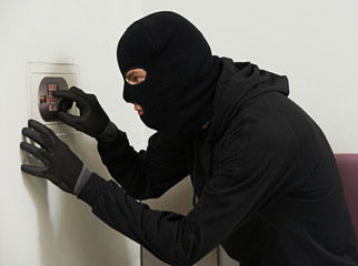 thief burglar at house code breaking