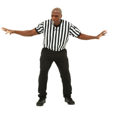 Attractive fit black man in referee uniform facing front and blo