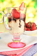 Delicious strawberry desserts in glass vase