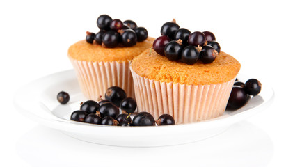 Tasty muffins with berries isolated on white