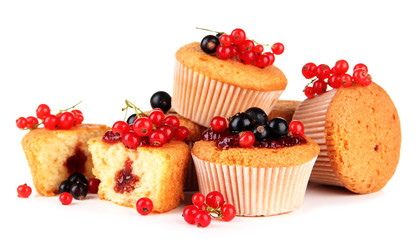 Tasty muffins with berries isolated on white