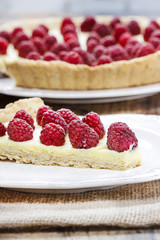 Raspberry tart on wooden table