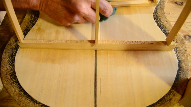 Flamenco guitar in manufacturing, tilt