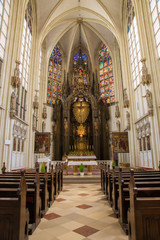 Fototapeta na wymiar Vienna - Presbytery and main altar of church Maria am Gestade