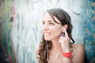 beautiful woman listening to music