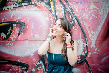 beautiful woman listening to music