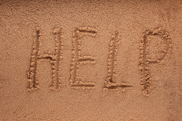 Help Sign on the beach