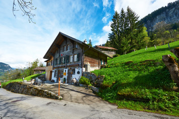 Fototapeta na wymiar Swiss chalet at Alps