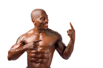 Strong bodybuilder man with perfect abs, shoulders,biceps, chest