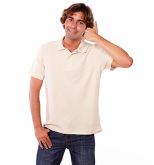 Fototapeta premium Latin young man gesturing call me sign