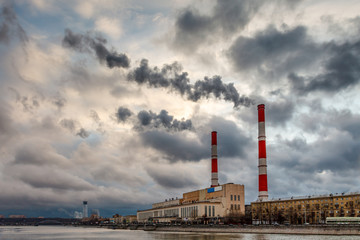 Obraz premium Cityscape of the Moscow River and Coal Power Plant, Moscow, Russ