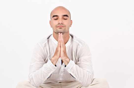 Spiritual man praying and meditating.