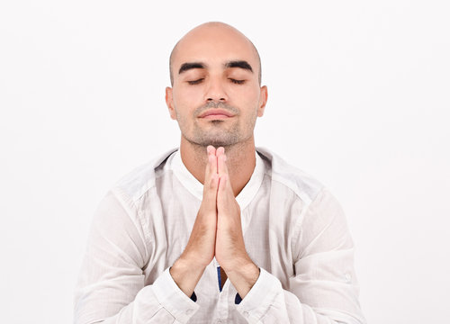 Spiritual man praying and meditating.