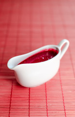 Sauce boat with red sauce