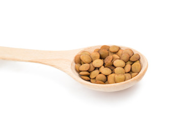 pulses in a wooden spoon isolated