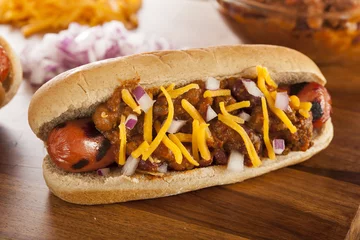 Rolgordijnen Homemade Hot Chili Dog with Cheddar Cheese © Brent Hofacker