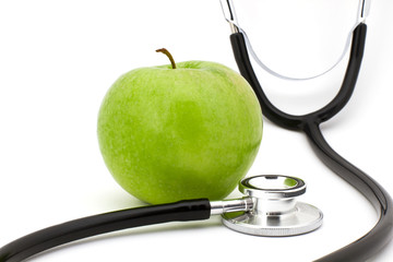 Apfel mit Stethoskop / Gesundheit