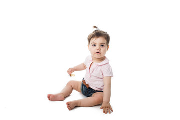 Pretty abbe looking at camera with a pazifier