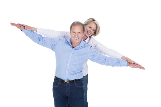 Portrait Of Mature Couple Having Fun - Powered by Adobe