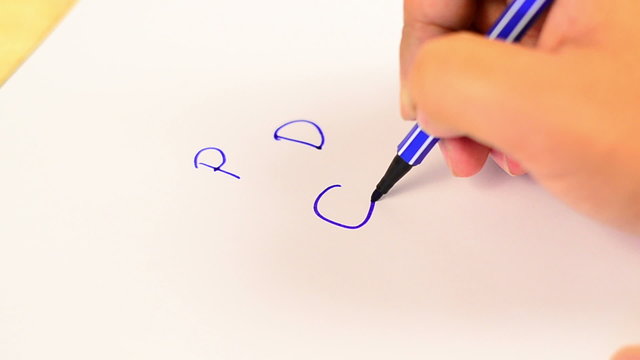 Male hand is writing PDCA cycle concept