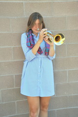Female trumpet player.