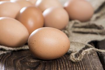 Fresh Eggs on wooden background