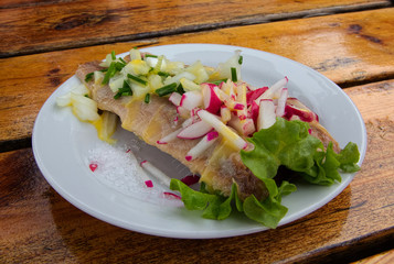 Smoked herring on a plate