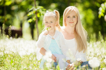 Mother and daughter in the park