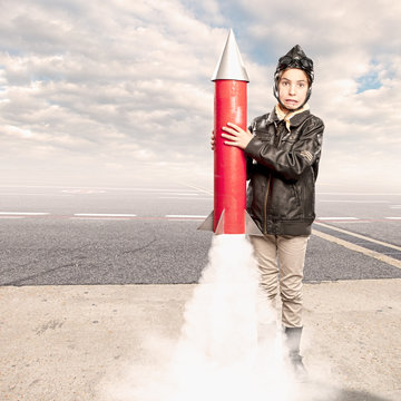 little aviator holding a rocket