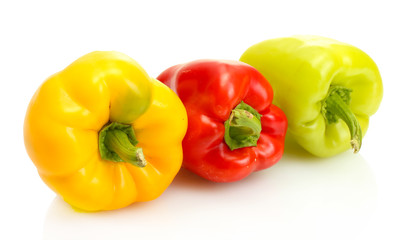 Obraz na płótnie Canvas fresh yellow, red and green bell peppers isolated on white