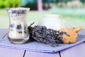 Foto op Plexiglas Glass of lavender sugar and fresh lavender flowers © Africa Studio