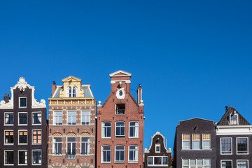 Ancient canal houses in the Dutch capital city Amsterdam