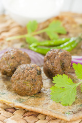 Kati Roll - Kofta and red onion in a paratha fried with eggs
