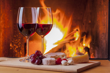 delicious cheese and wine at the fireplace