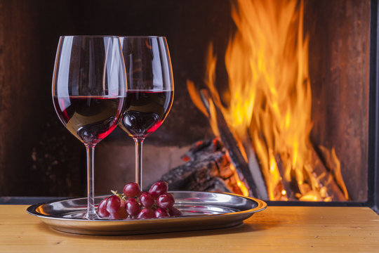 delicious wine, drinks and snacks at fireplace