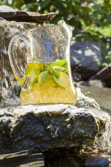 refreshing home made lemonade in cold waterfall